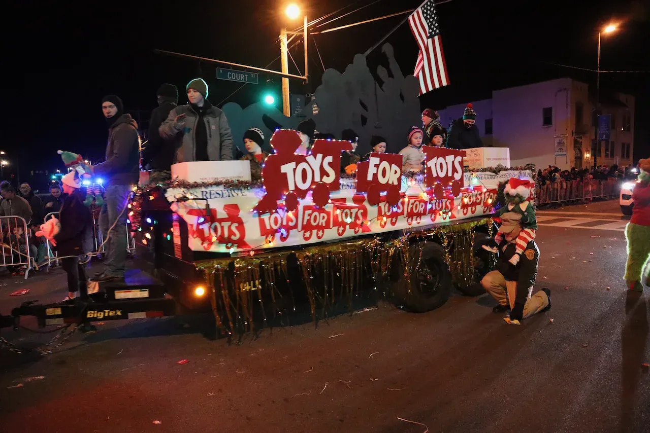 Toys for Tots float traveling through downtown Florence during the 2024 Christmas parade